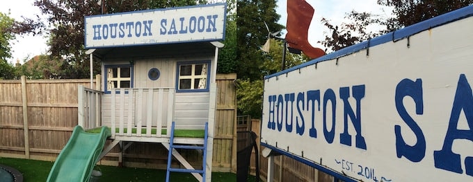 Tower playhouse decorated to resemble Western saloon with sign saying 'Houston Saloon'