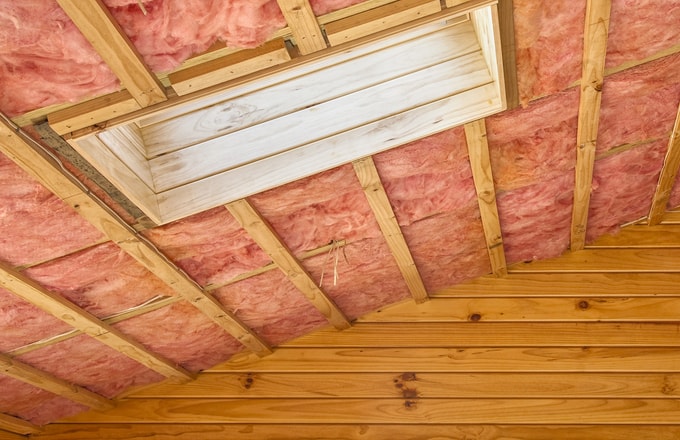 Insulating a wooden building's ceiling