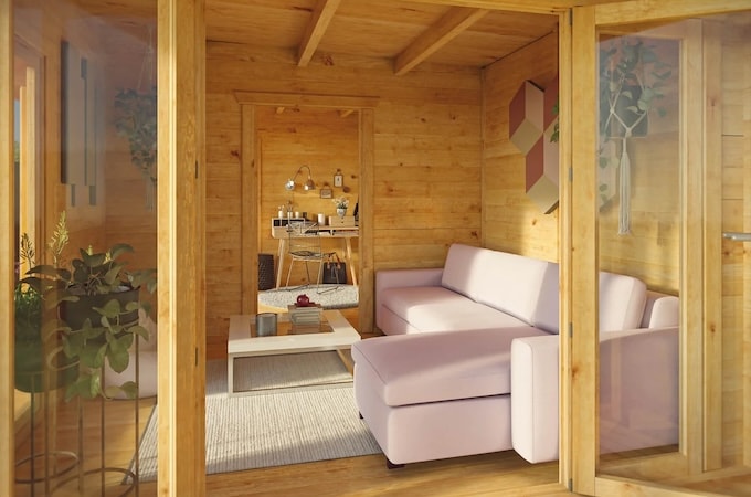Interior of log cabin decorated with furniture