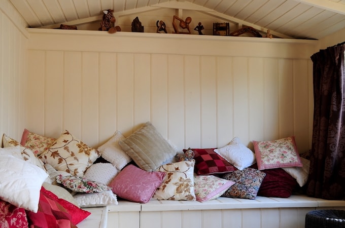 Interior of she-shed with seating