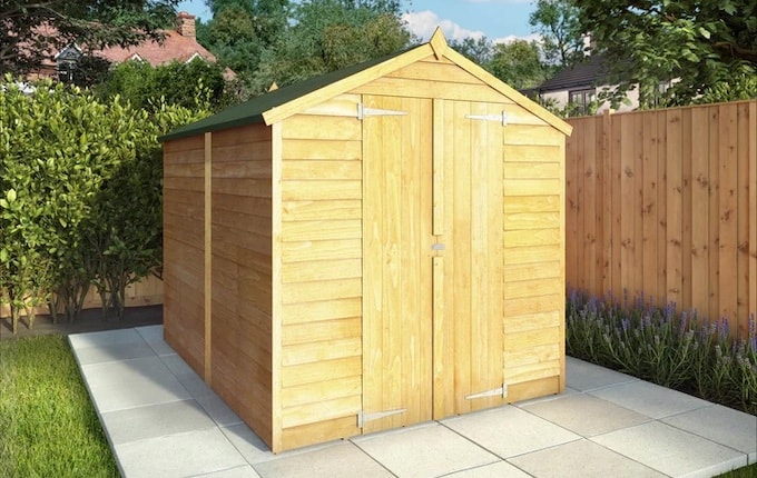 Large wooden shed with doors closed