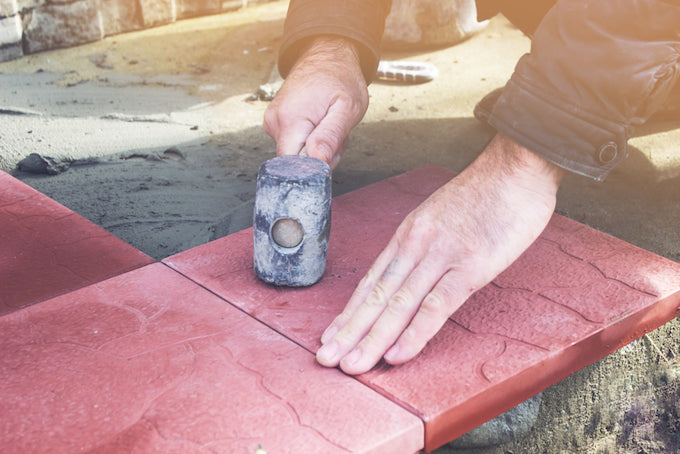 laying paving slabs