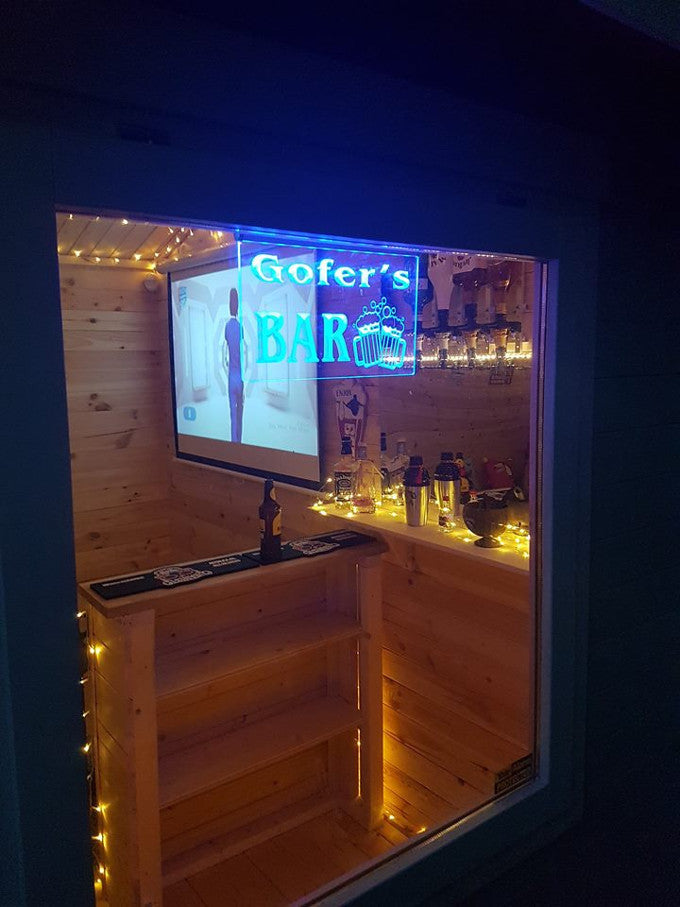 LED sign in log cabin winow