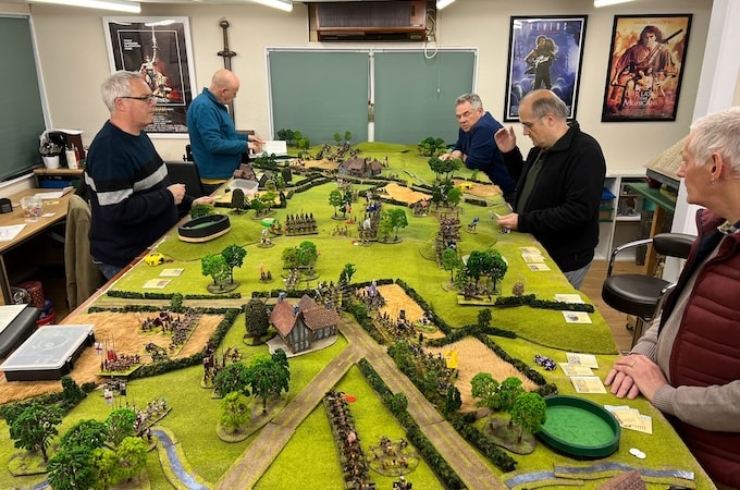 Men in shed playing WarGames