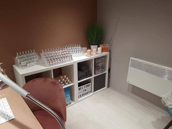 Pink and grey nail salon with storage