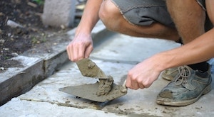 Pointing paving slabs with excess mortar