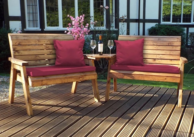 Outdoor seats with red cushions