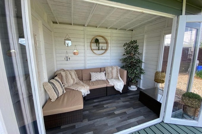 Interior of summerhouse decorated in scandi style