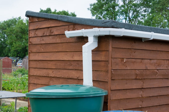 View of shed guttering with water butt