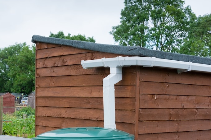 Guttering and waterbutt in shed roof