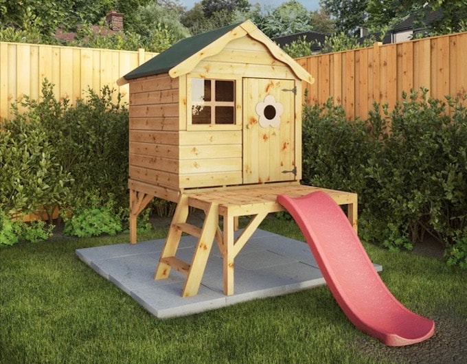 Small snug playhouse with slide from Waltons