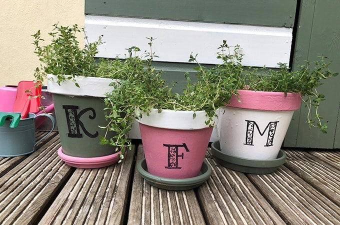 Green, pink and white plant pots