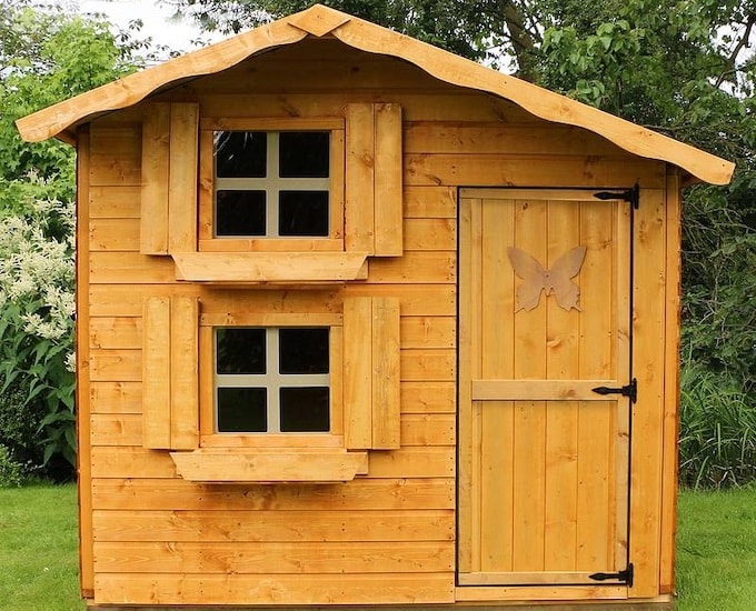 Unpainted two storey wooden playhouse with butterfly decal