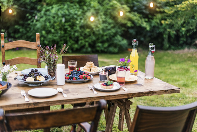 Indoor dining table moved to garden