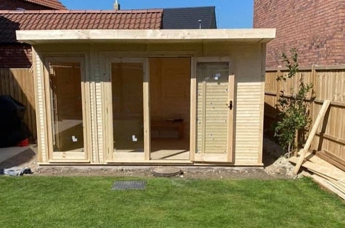 Waltons unpainted Insulated Garden Room newly installed