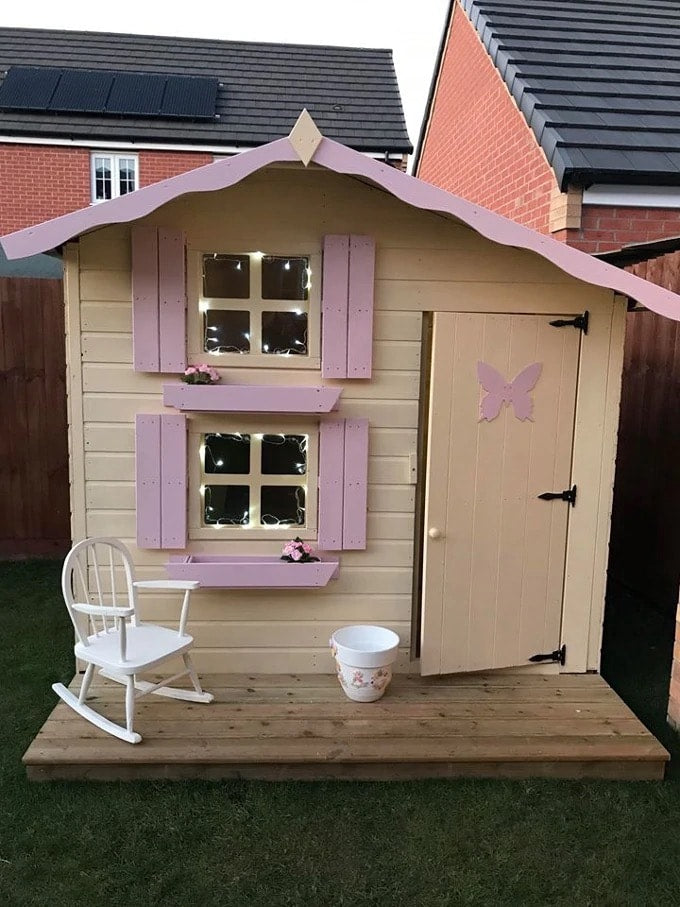 Cream and pink snowdrop playhouse with veranda and chair