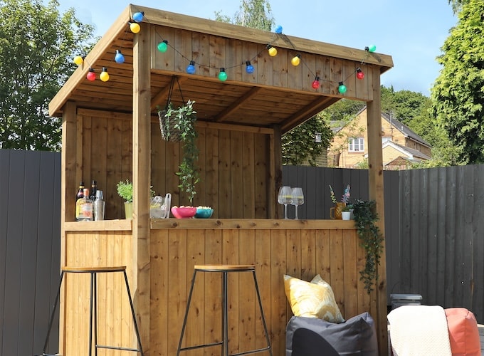 Decorated wooden garden bar