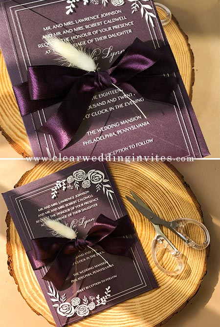 Amazing colorful ribbons adds to the purple acrylic wedding card