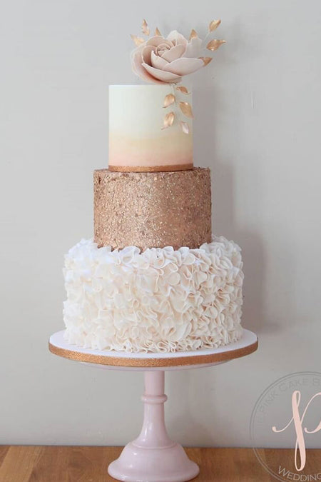 a elegant wedding cake with watercolor ombre and fresh floral topper is a lovely idea for a spring wedding