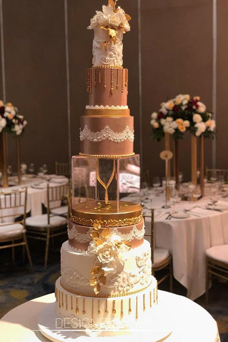 Rose Gold Wedding Cake with Glass tier separator is a lovely idea for a formal wedding