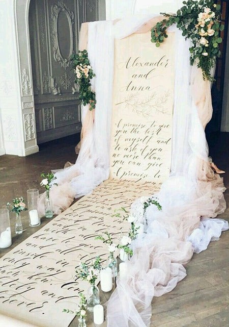 A custom ONCE-UPON-A-TIME backdrop was the perfect setting for this ceremony straight out of a fairytale.