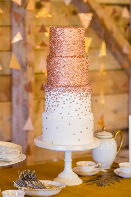 We absolutely adore rose gold glittery cake
