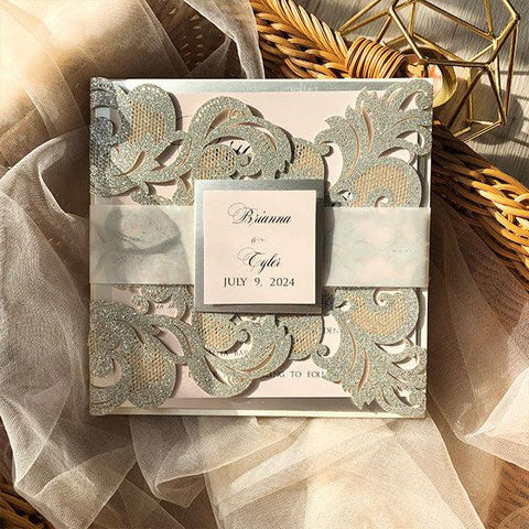 silver glittery and blush pink invitations with translucent vellum belly band CWIL16