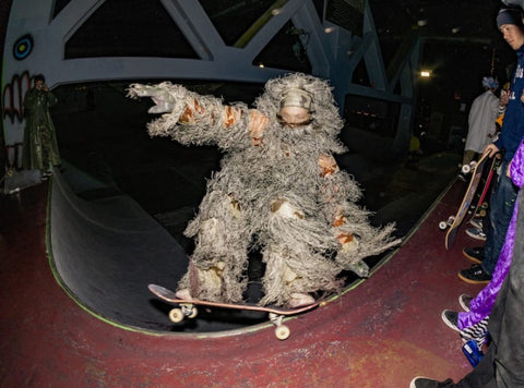 A skater wearing a yeti costume skating at Burnside Skatepark