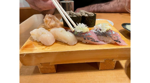 sushi on a wooden tray