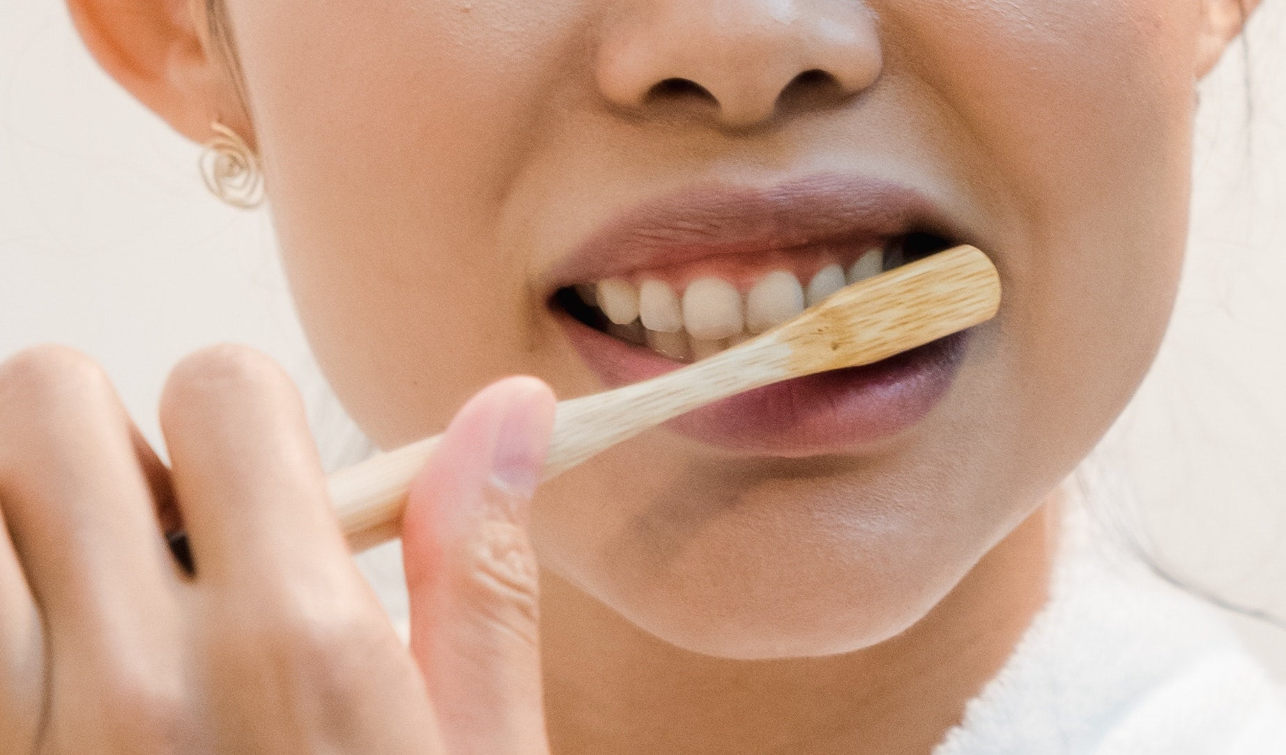 Woman brushing her teeth