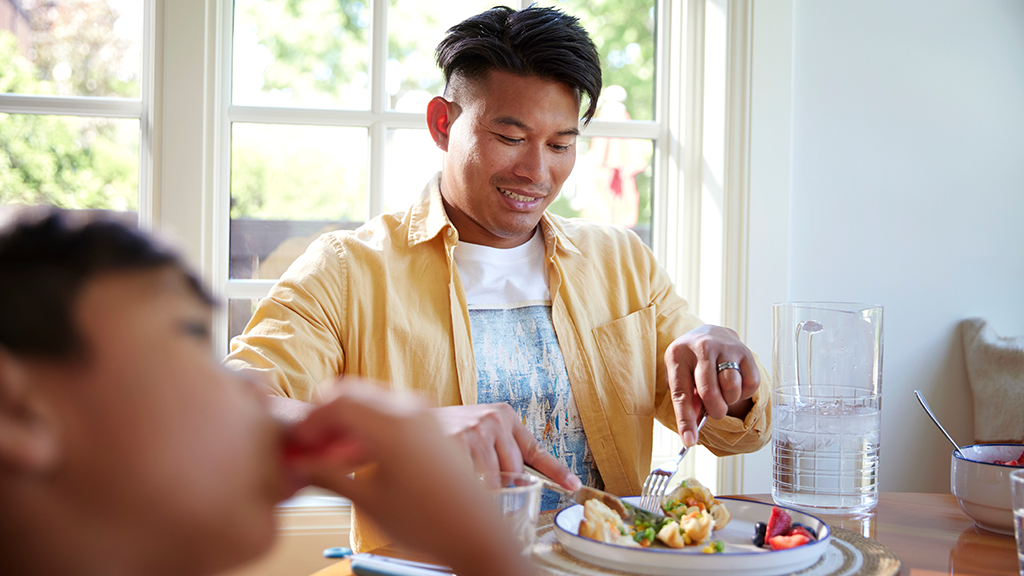 man eating thanksgiving meal