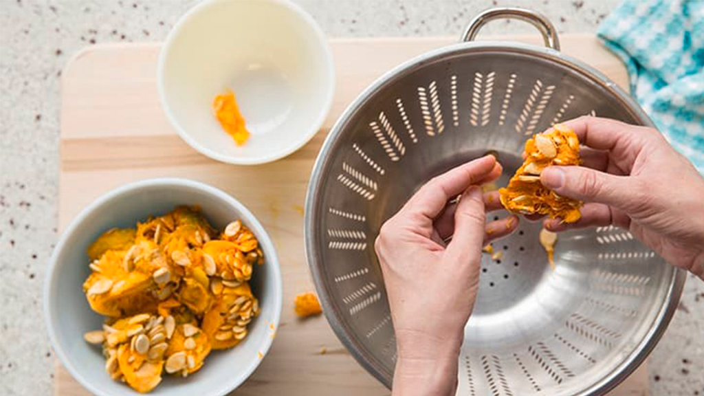 pumpkin guts with strainer