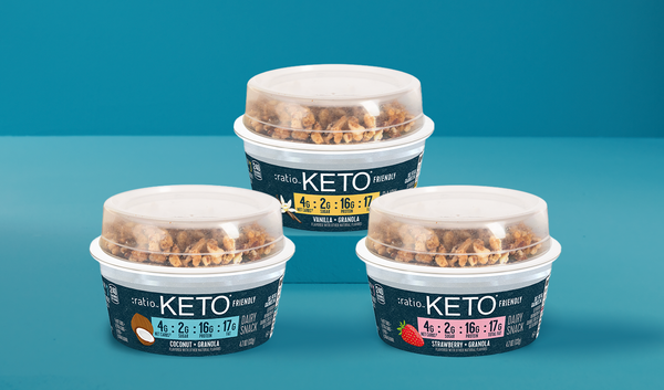 An assortment of three Ration KETO Friendly Yogurt snacks with granola toppers.