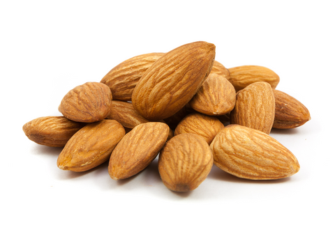 Small group of almonds stacked on top of each other.