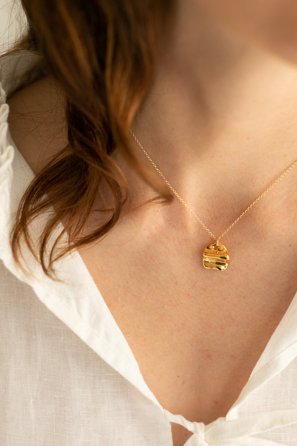 Folded Oval Necklace · Gold