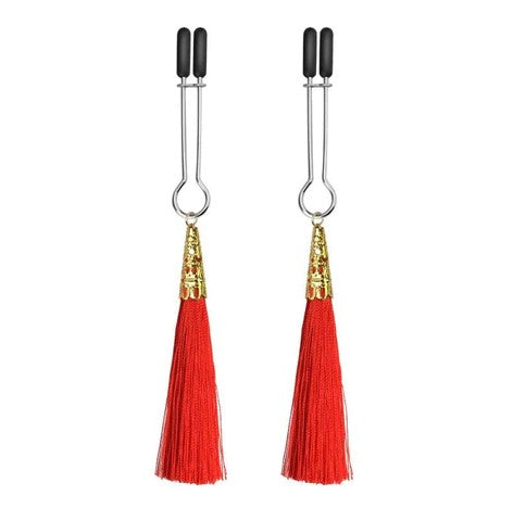 Niple clamps with red tassels