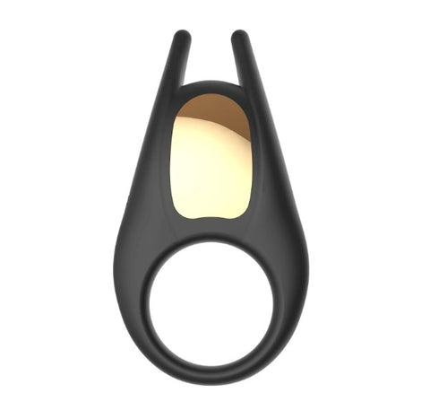 A cock ring in black silicone with shiny gold detail and clit-tickling tips. 