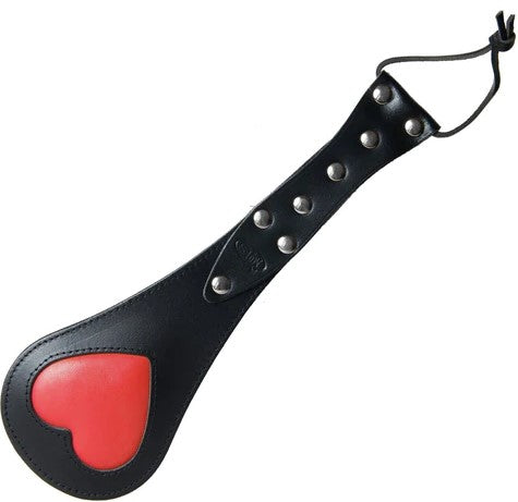 black leather paddle with red padded heart