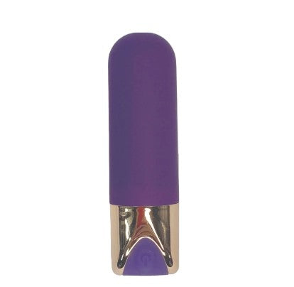 a tiny bullet vibrator covered with purple silicone and gold bottom. 