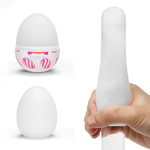 A hand stretching tenga egg over a clear pole