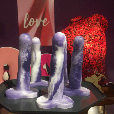 Five silicone dildos in purple and white marble