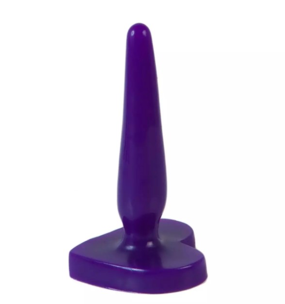 A slim butt plug in purple silicone
