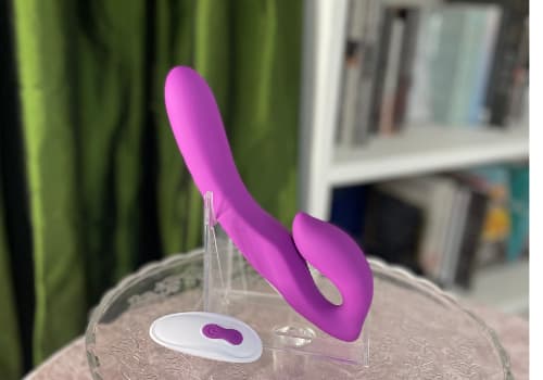 purple strapless dildo with white remote control