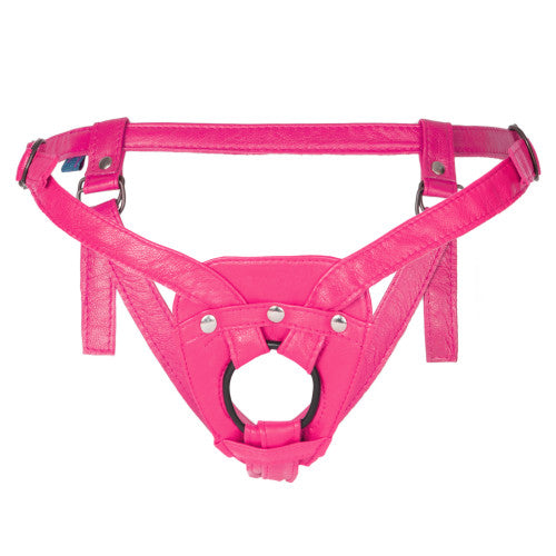 a bright pink leather strap-on and pegging harness