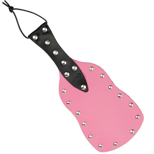 shaped spanking paddle in pink leather with a black handle