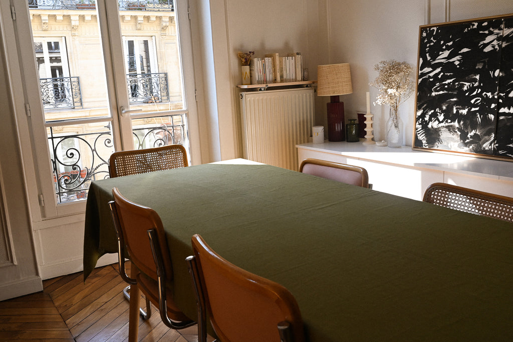 Our thick olive-coloured linen tablecloth on Diane's table