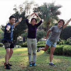 A group of friend striking a pose at the park