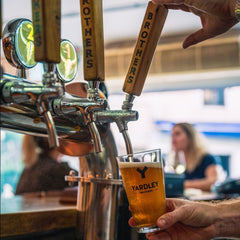 Yardley Brothers beer taps, pouring a beer