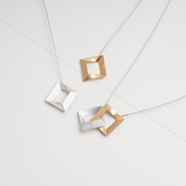 Sterling Silver 925  pendant "Log Ζ zeta". It has two connect in one and modern design. Two-tone color of silver and gold by japanese jewelry brand MENTOSEN.