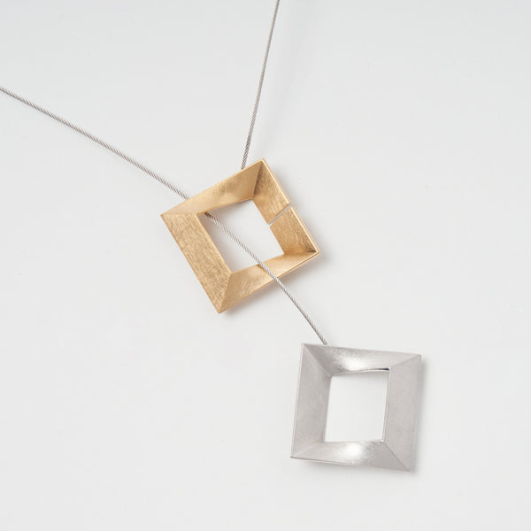 Sterling Silver 925  pendant "Log Ζ zeta". It has two connect in one and modern design. Two-tone color of silver and gold by japanese jewelry brand MENTOSEN.